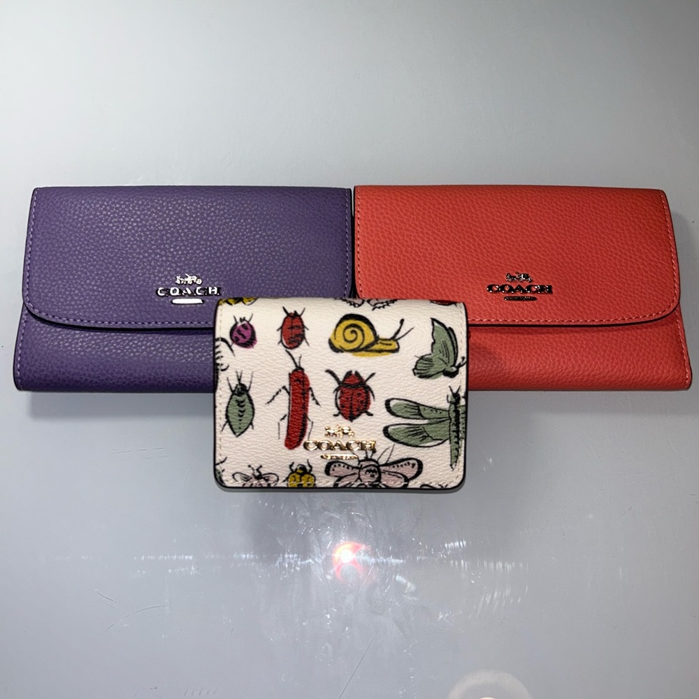 Coach Women's Wallets in Purple, Coral and Printed White